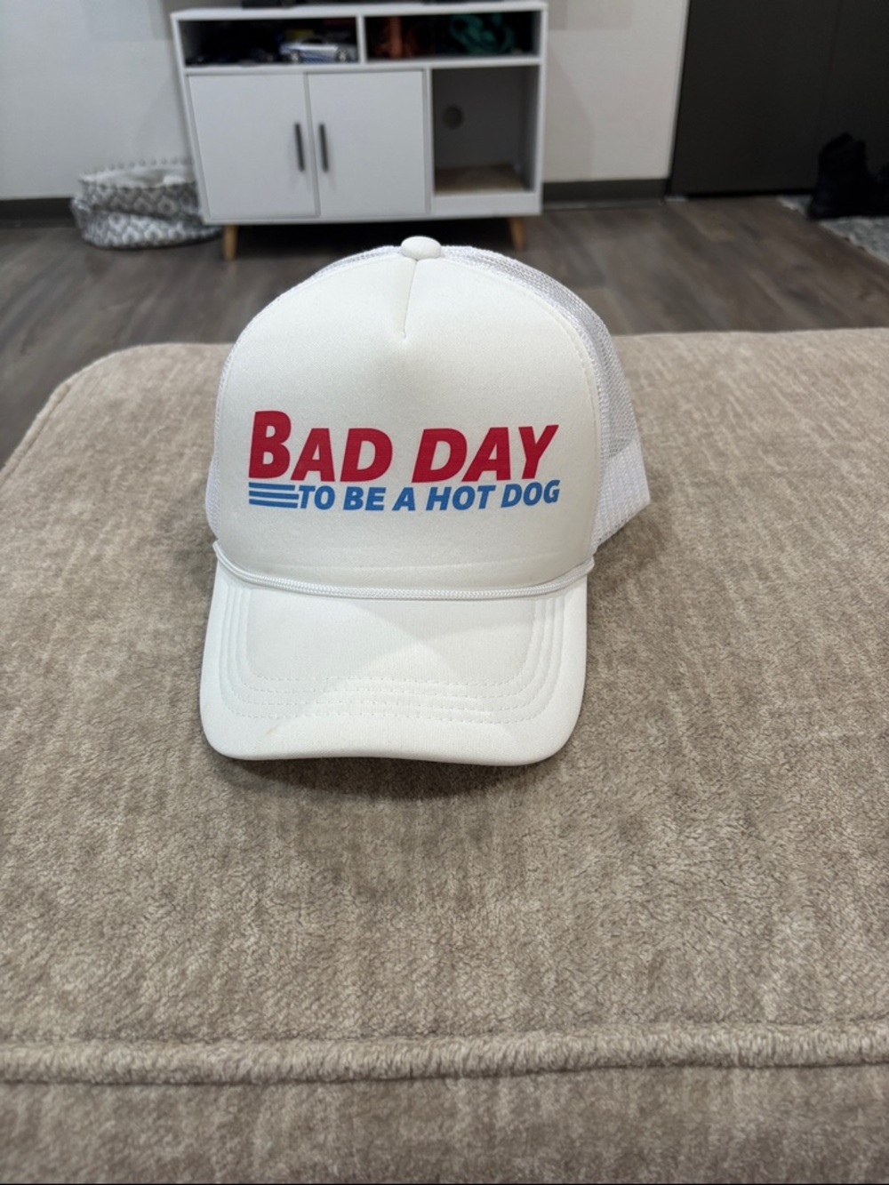 White Trucker Hat with "BAD DAY TO BE A HOT DOG" Text